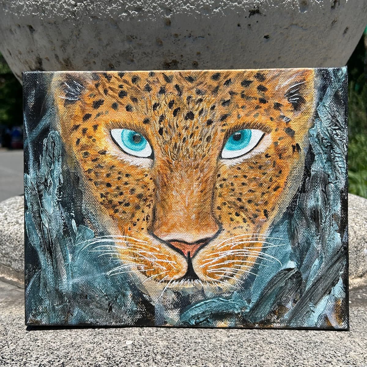 Queen of the Bush portrait of a Leopard with stunning turquoise eyes by NYC artist Heather Collis