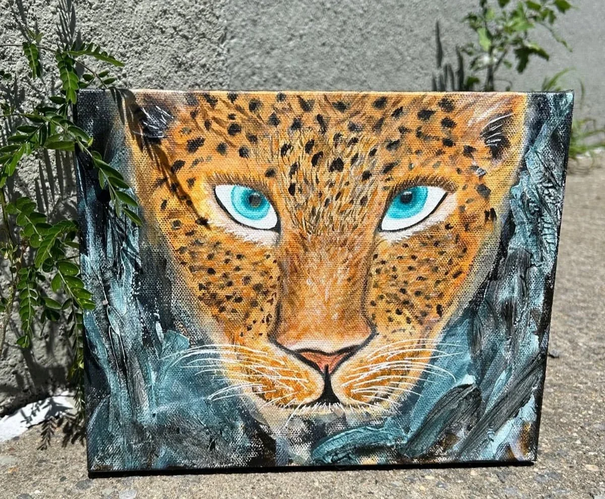 Queen of the Bush portrait of a Leopard closeup of her face and gorgeous eyes