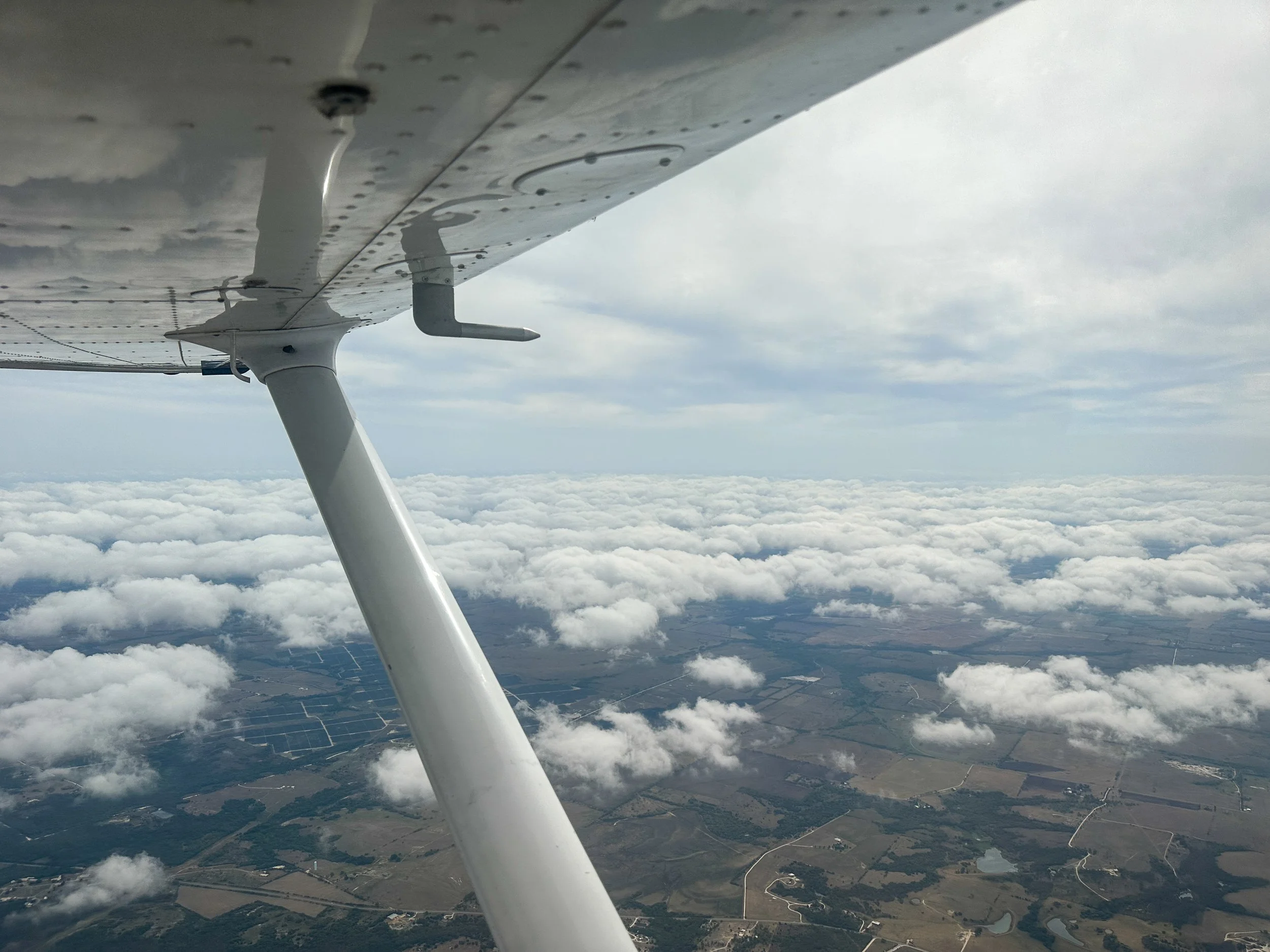 Above the clouds on the way to Waco, Texas
