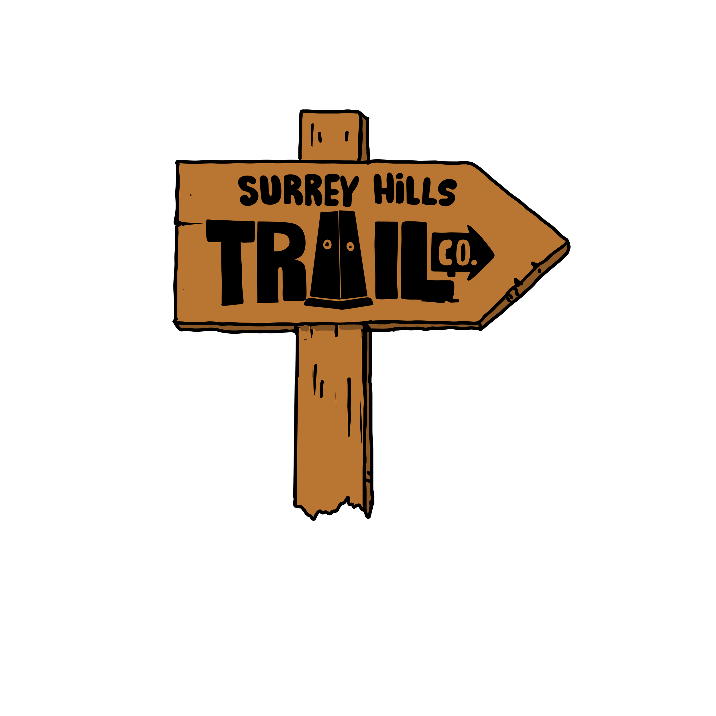 Hand-drawn wooden sign for Surrey Hills Trail Co. with an arrow, mounted on a post.