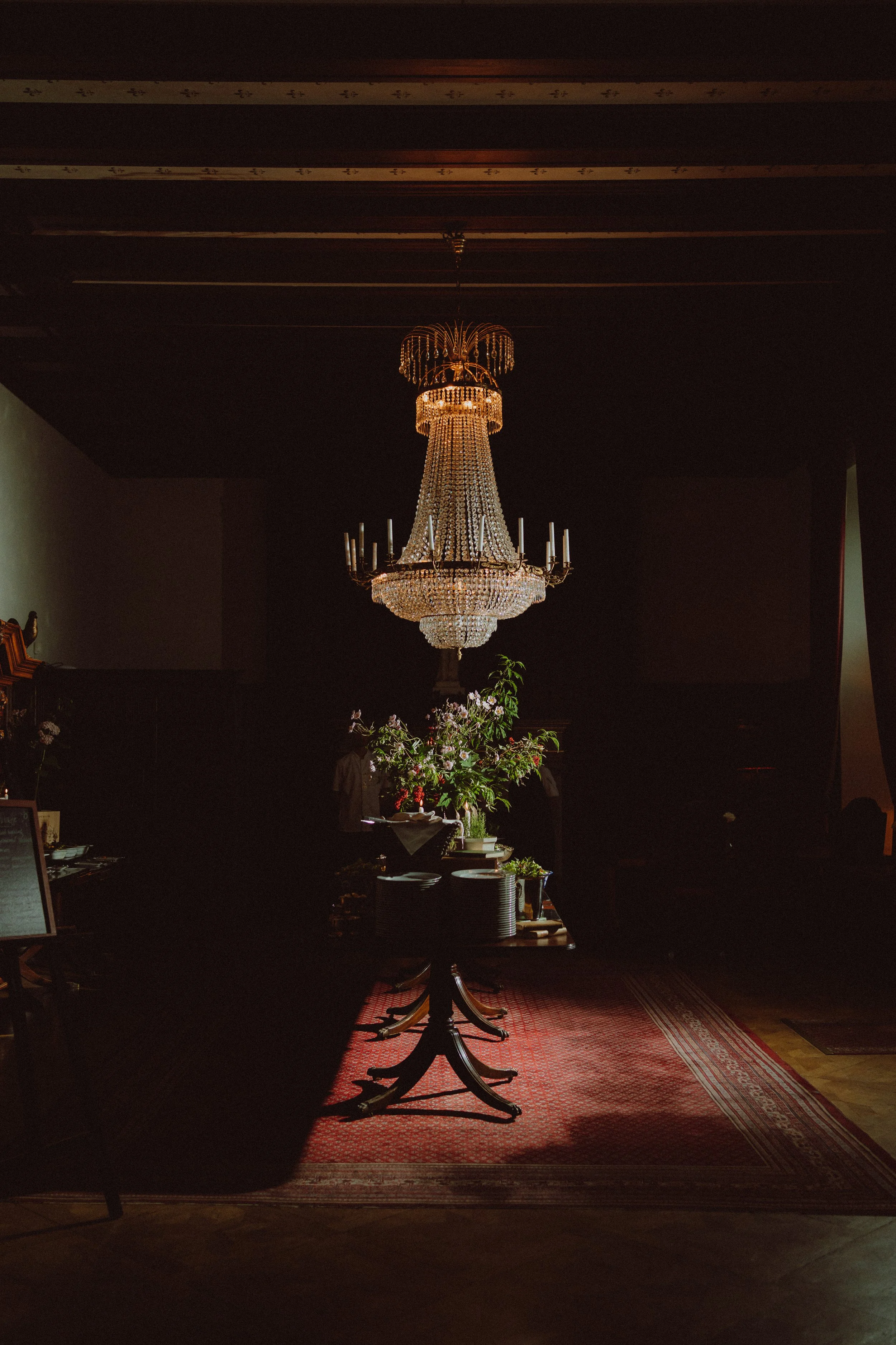 Wedding dinner scene with guests and ambient light