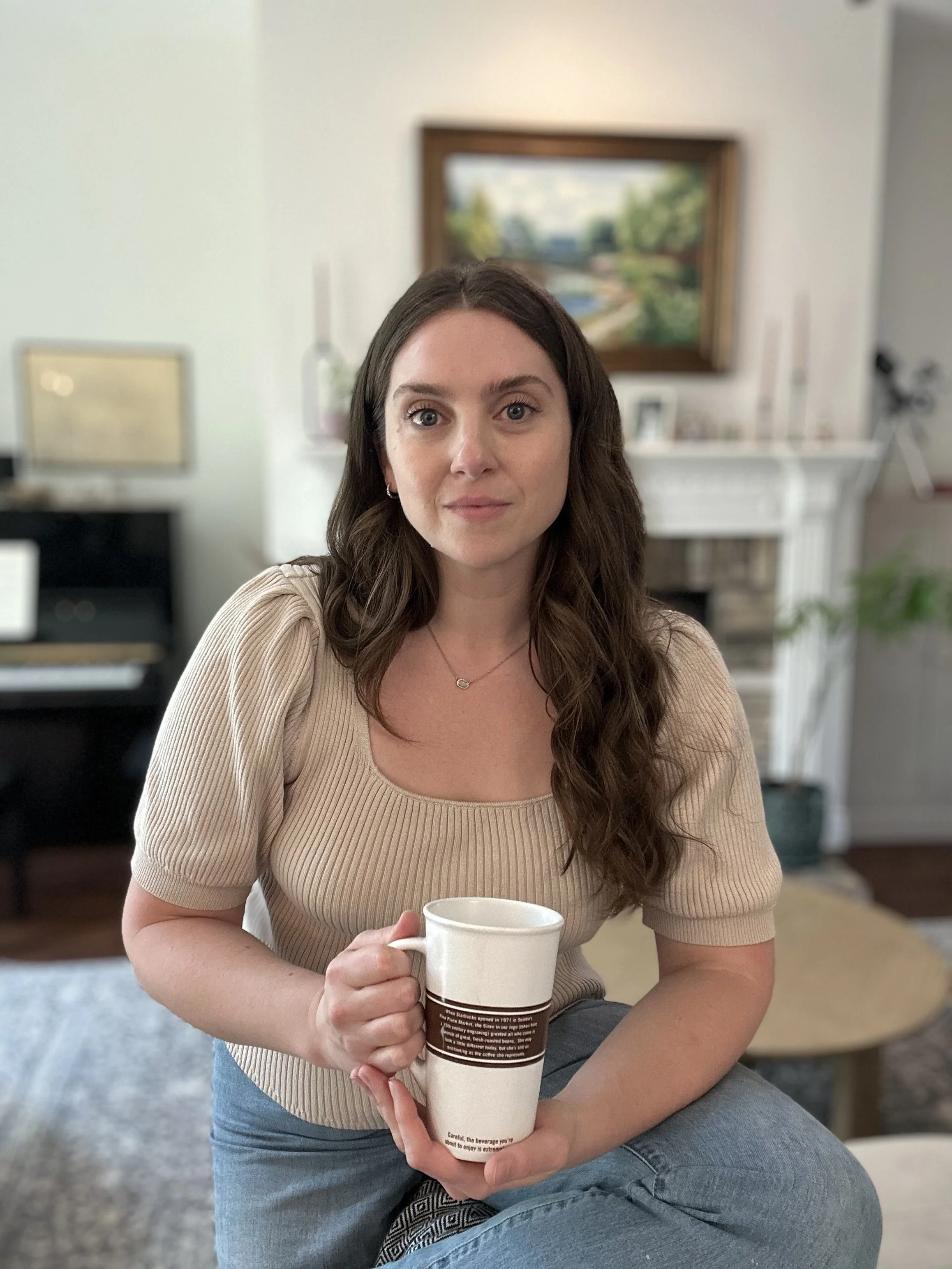 Medical nutrition therapy dietitian with coffee mug ready to discuss diet and lifestyle in nutrition counseling session where clinical guidelines from Academy of Nutrition and Dietetics and American Heart Association meet holistic health and wellness