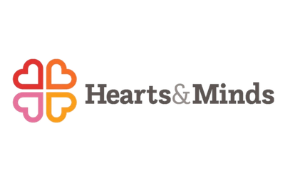 Hearts and Minds logo with a pink, red, orange, and yellow heart-shaped design next to the text 'Hearts & Minds'.