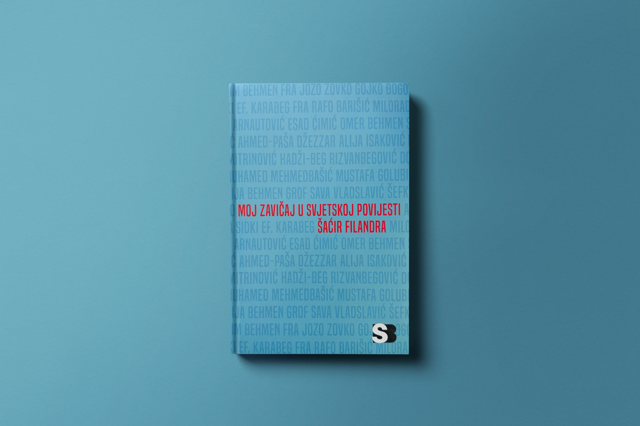 A book with a blue cover and red title text, placed against a matching blue background. The cover features a pattern of blue text with names on the front.