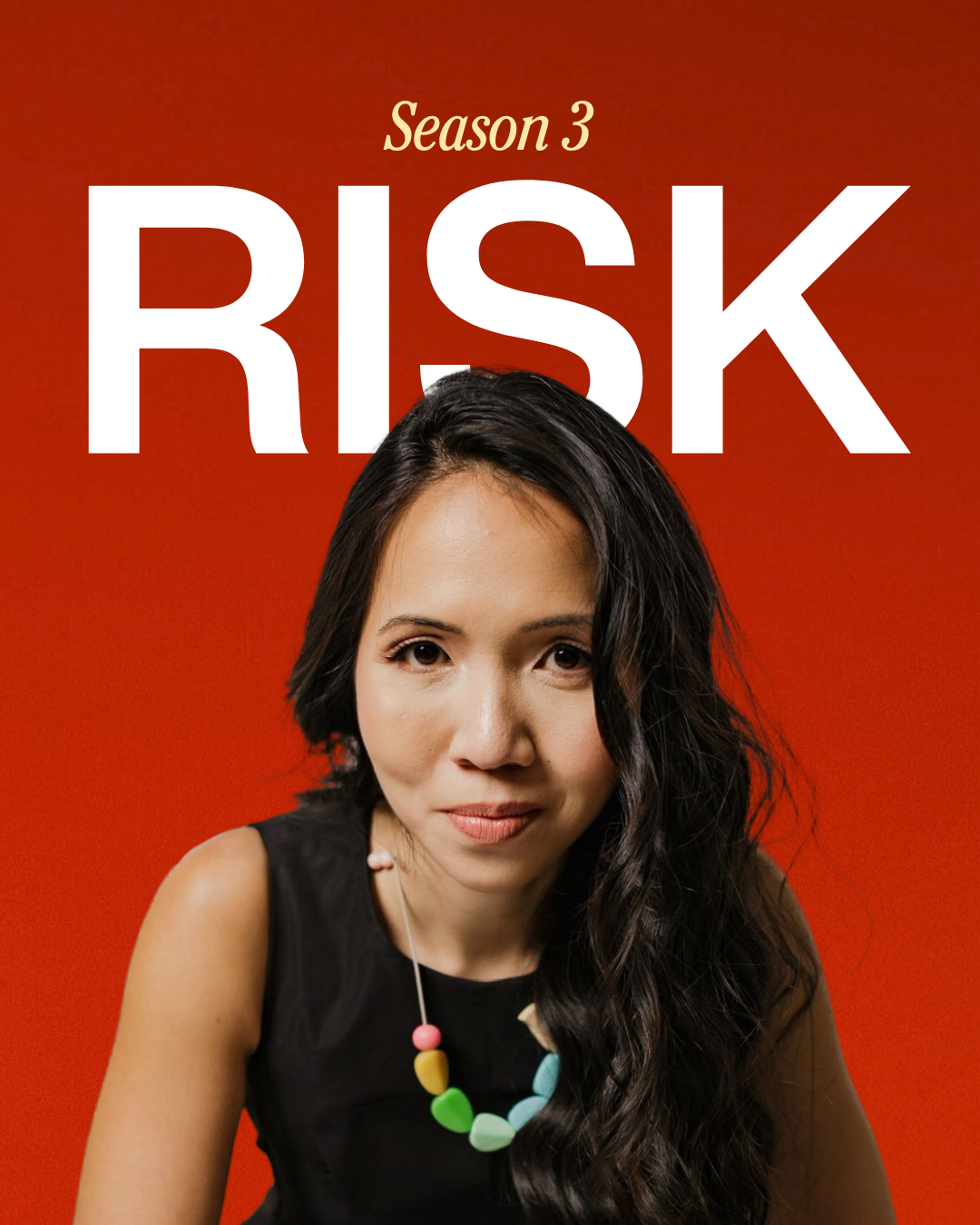 A woman with long dark wavy hair wearing a black sleeveless top and a colorful beaded necklace against a red background. The text 'Season 3 RISK' is displayed above her head.