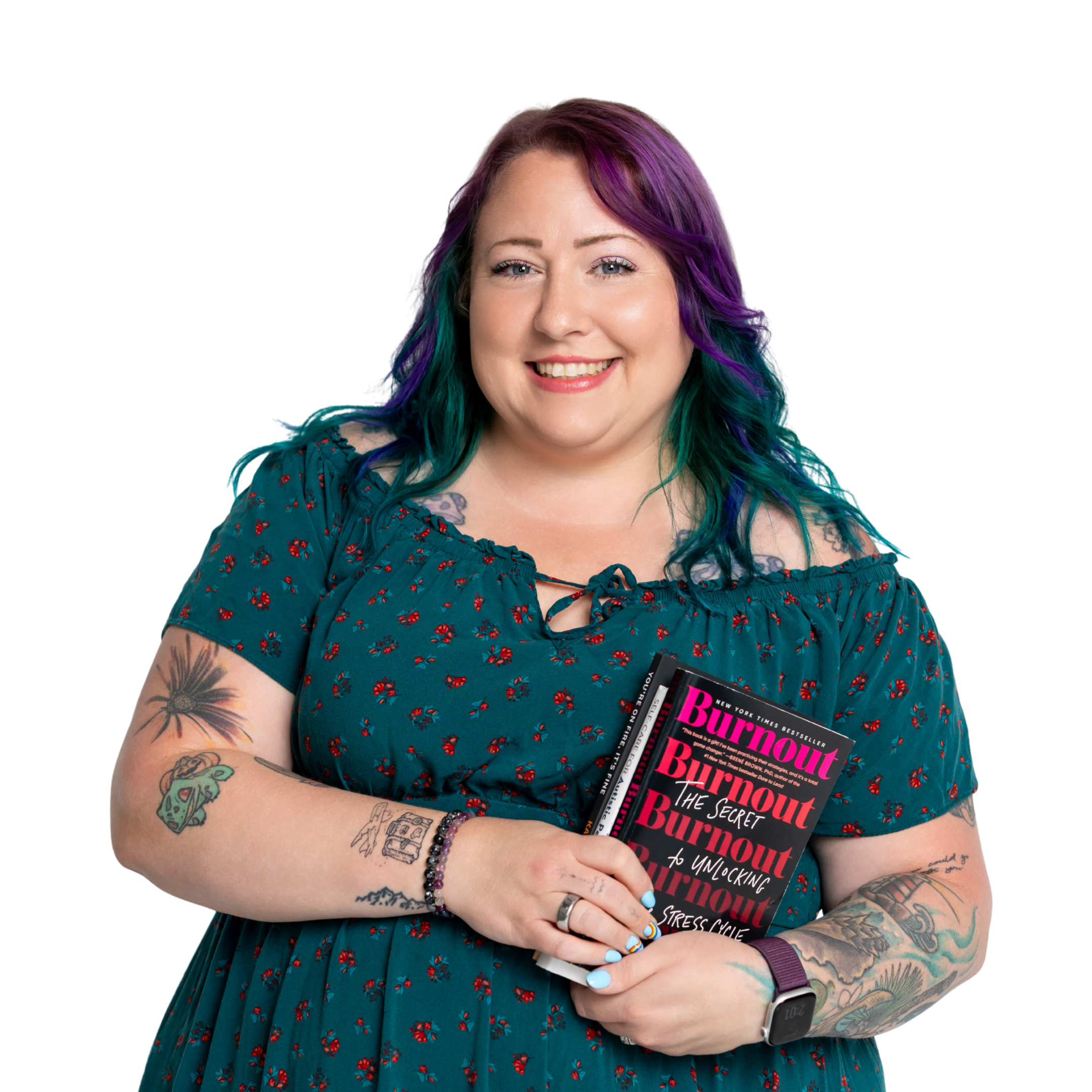 Samantha Willi smiling while holding the book Burnout: The Secret to Unlocking the Stress Cycle