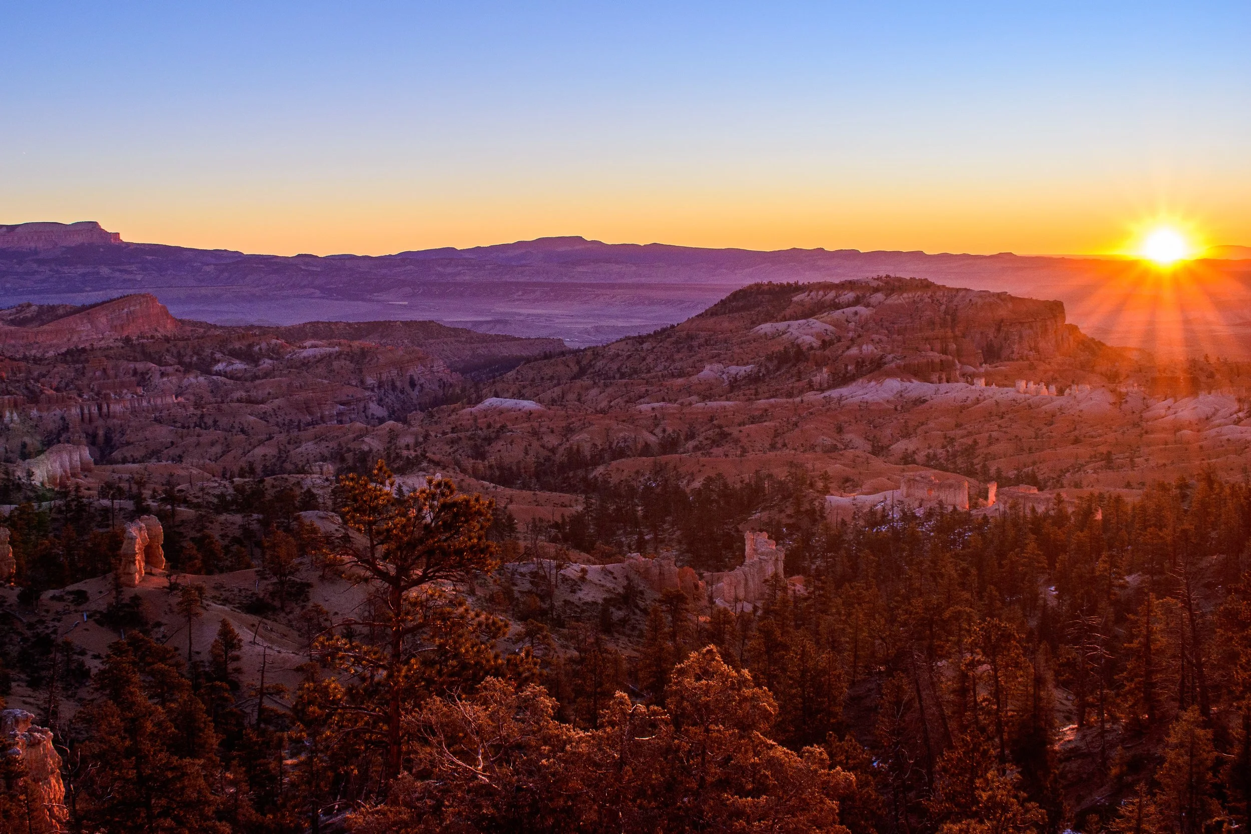The sunrises in Bryce Canyon National Park , Utah bring color, depth and overwhelming vastness to the soul.