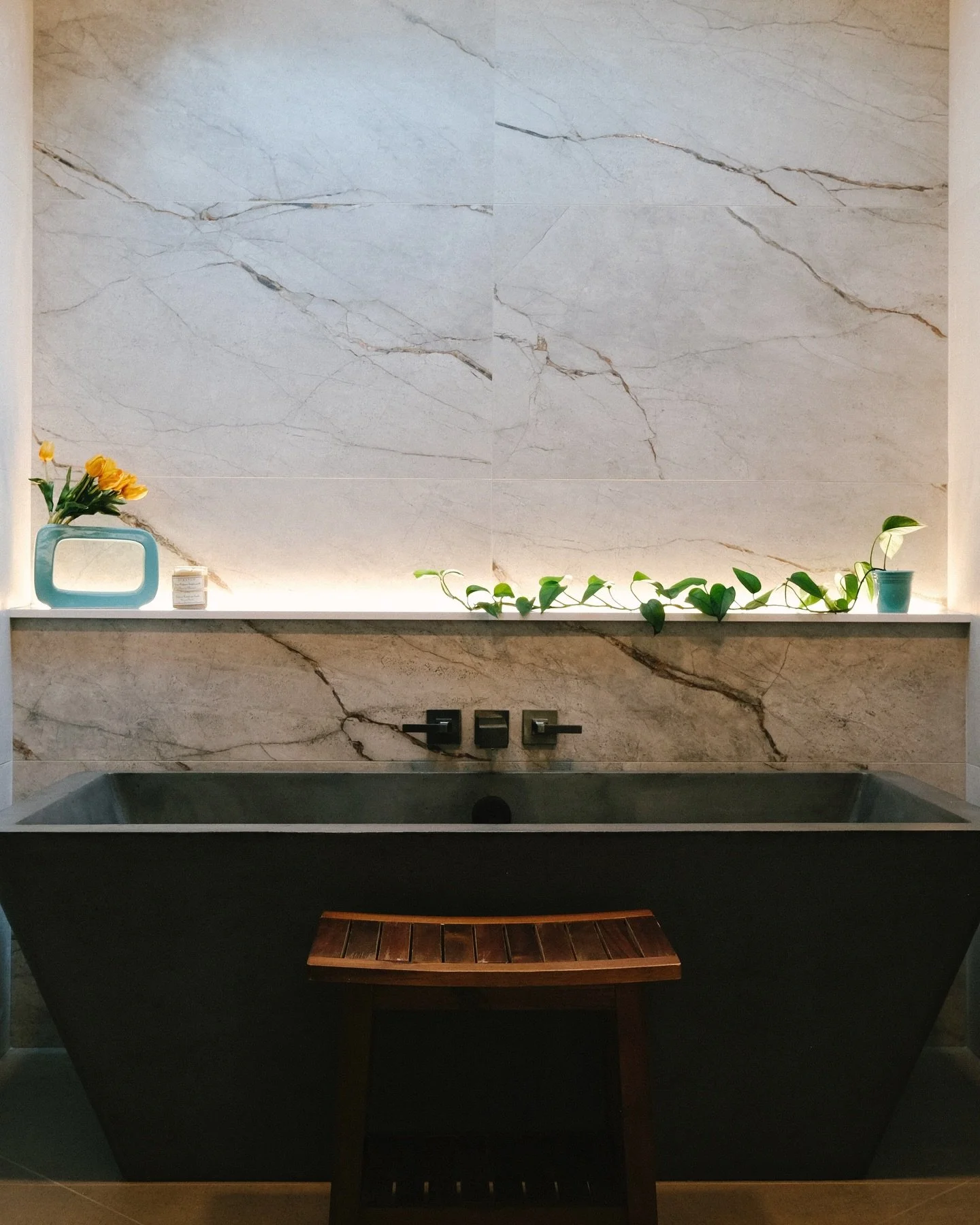 Moody. Timeless. Striking.

Taking this primary bath from drab to pure luxury meant reimagining it to be both grounded and elevated; and with the gorgeous, expansive natural surroundings that cradle this beautiful home and the chic couple who owns it