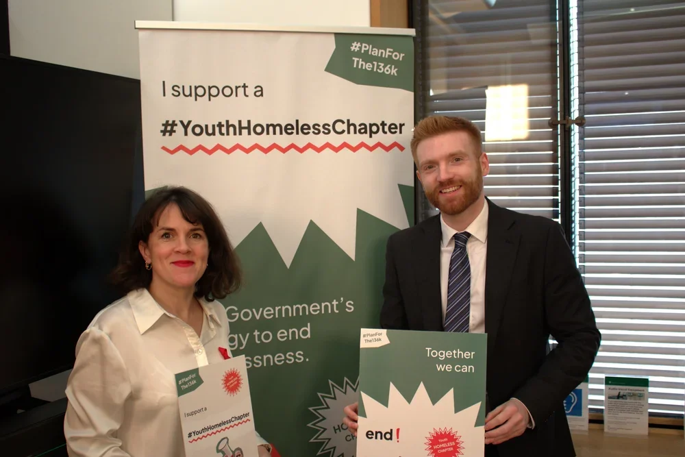 Danny Beales MP and Rachel Blake MP holding signs in support of the #Planforthe136k