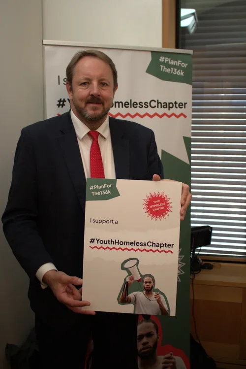 Toby Perkins MP holding up a sign in support of the #Planforthe136K