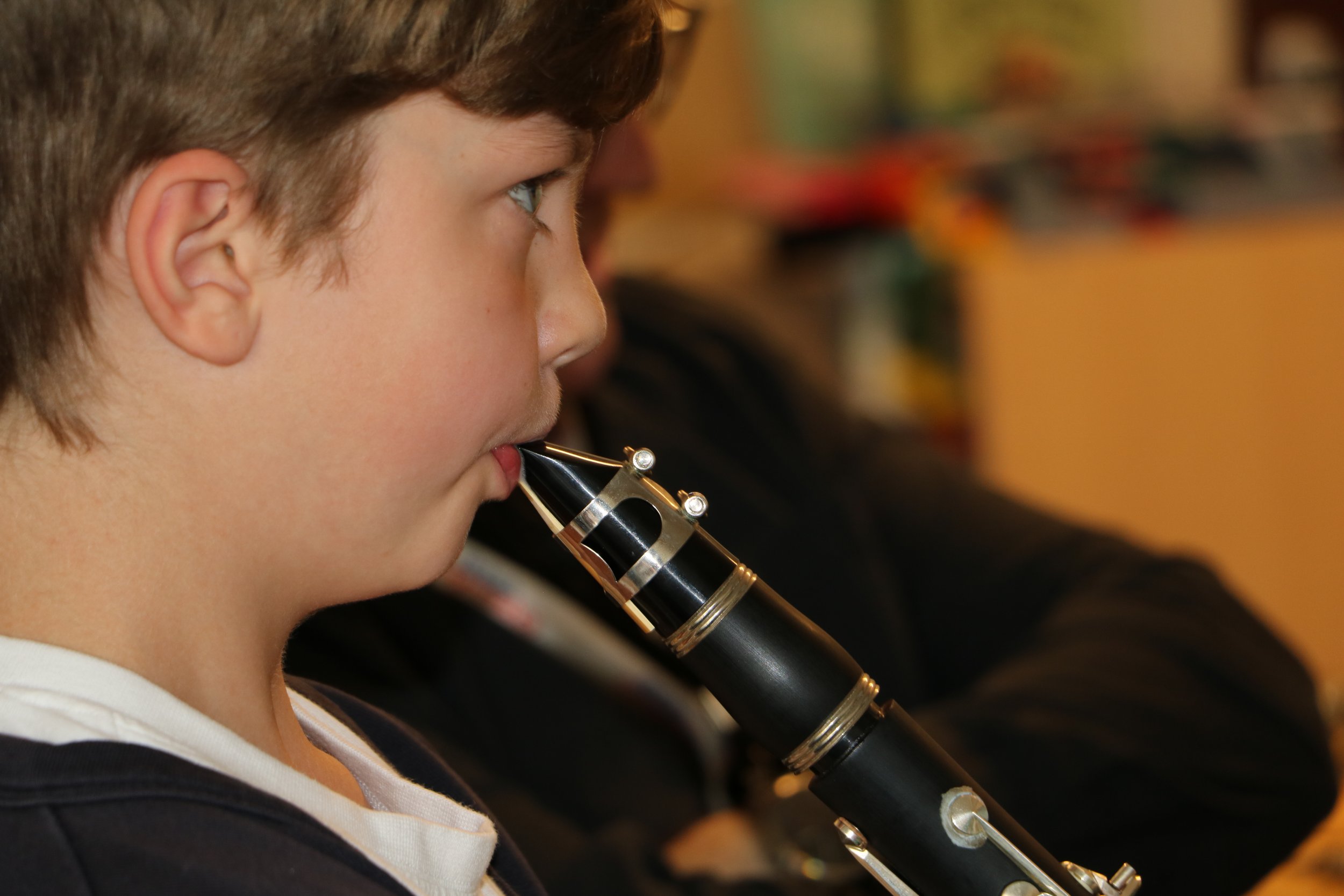 Child playing clarinet