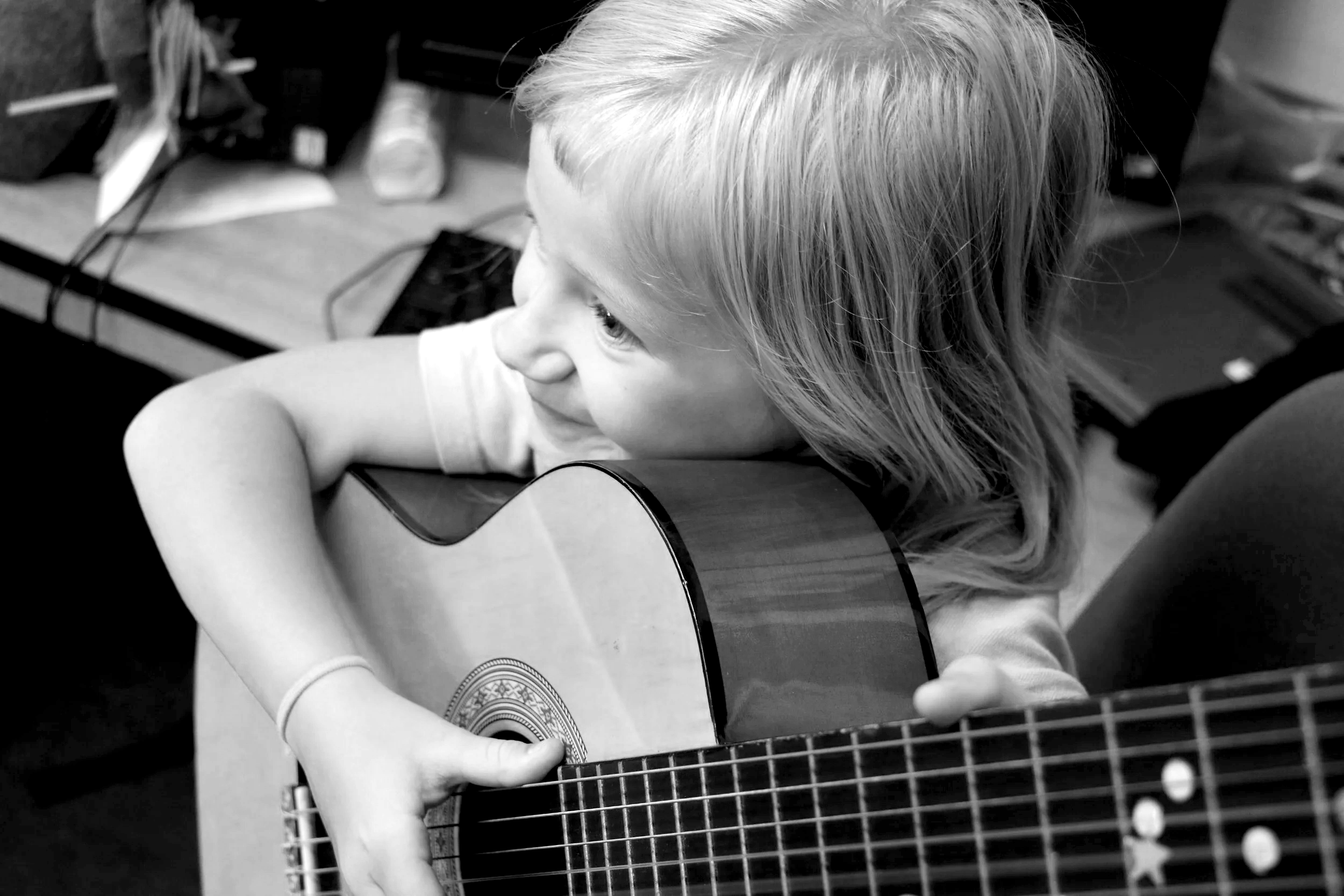 Child playing guitar