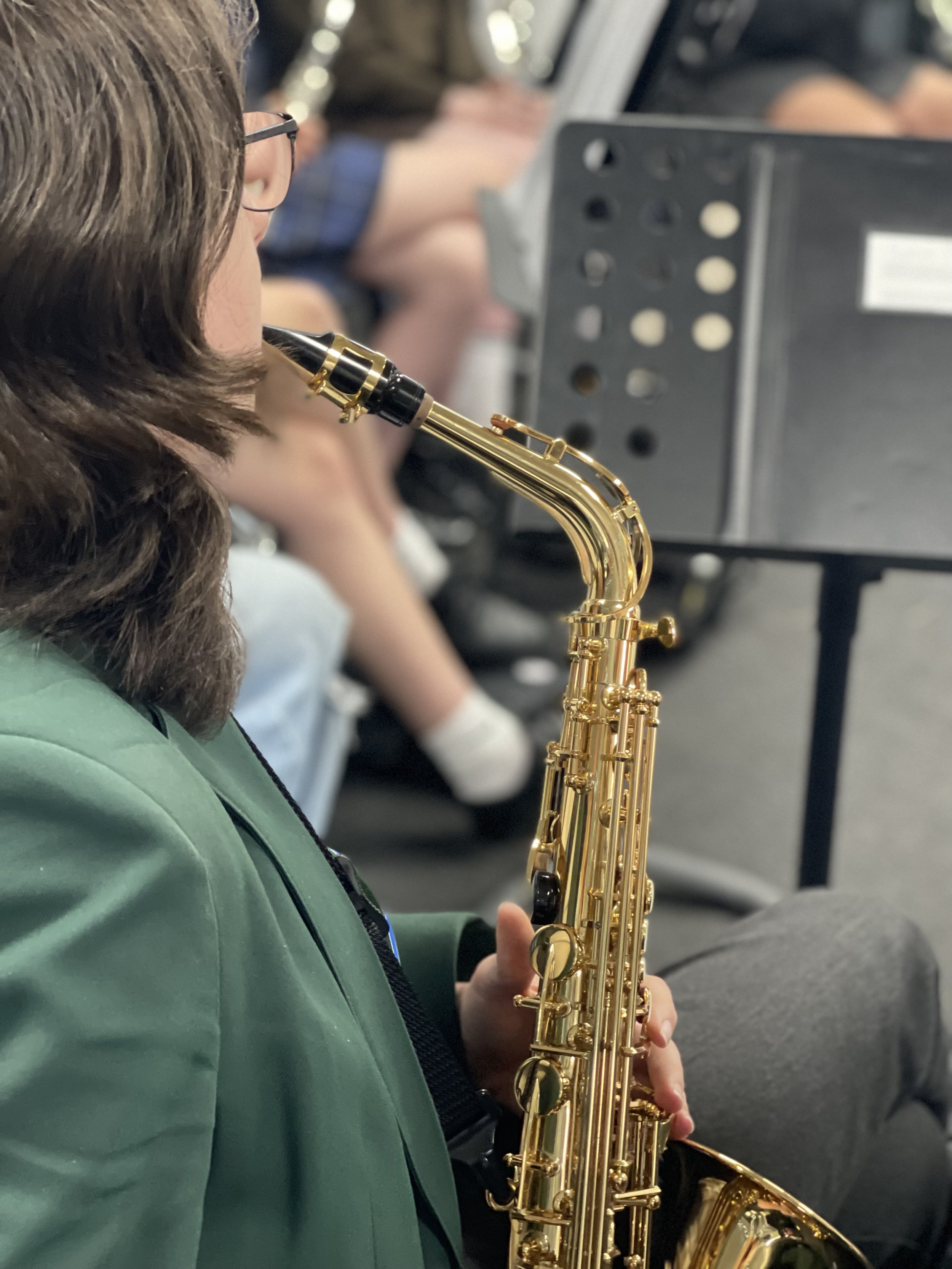 Someone playing saxophone