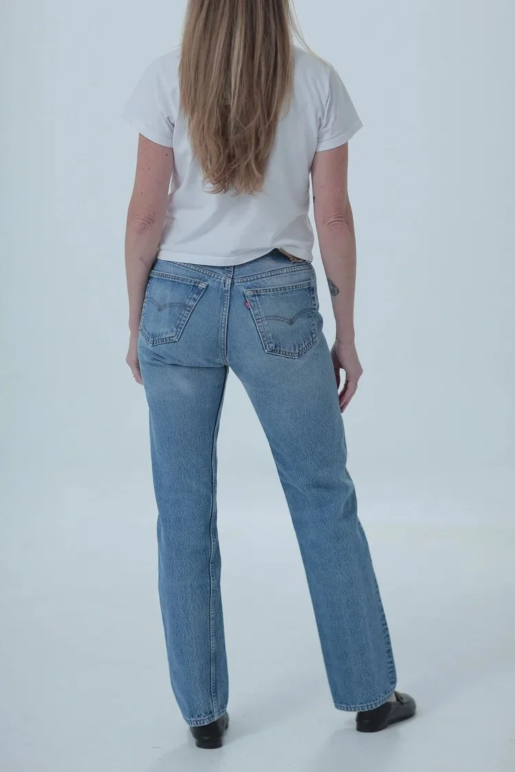 Levi's 501 light medium wash, fitted with a little room, full length, rear view