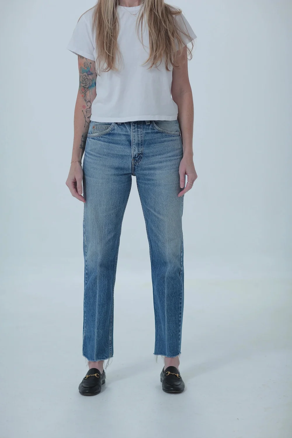 Levi's 505 medium wash, fitted in hips with a little room in waist, front view