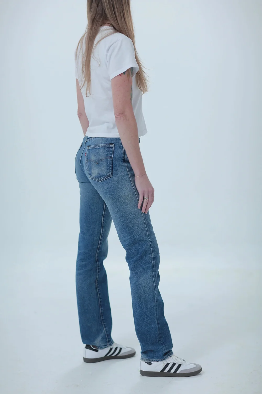 Levi's 505 darker medium wash, fitted, full length, side view