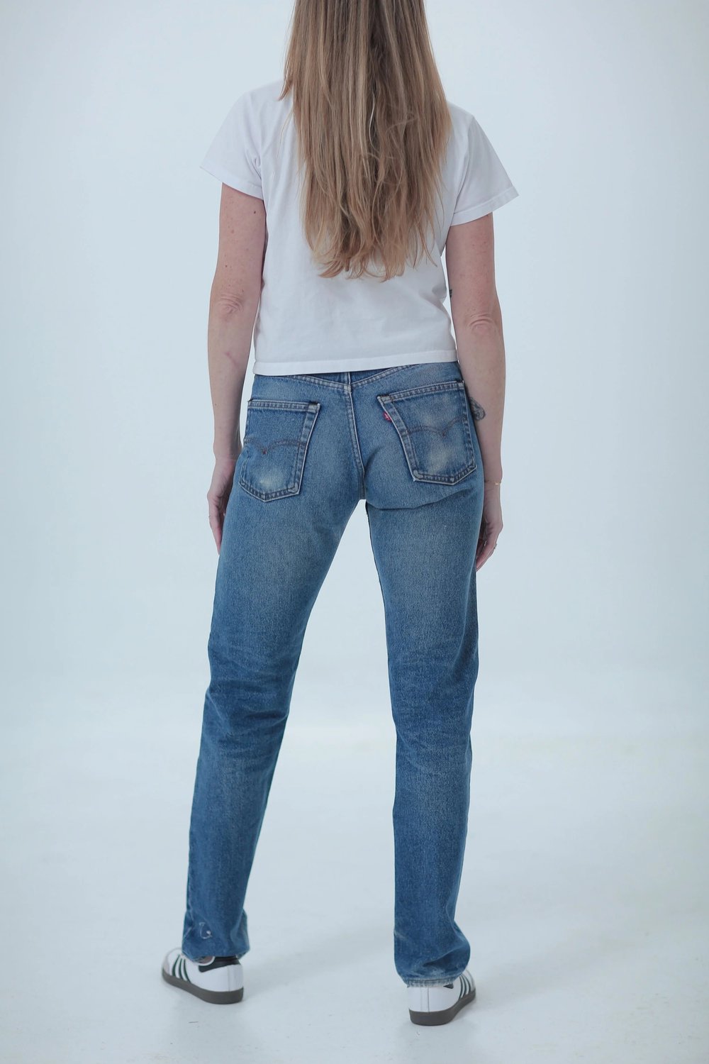 Levi's 505 darker medium wash, fitted, full length, rear view