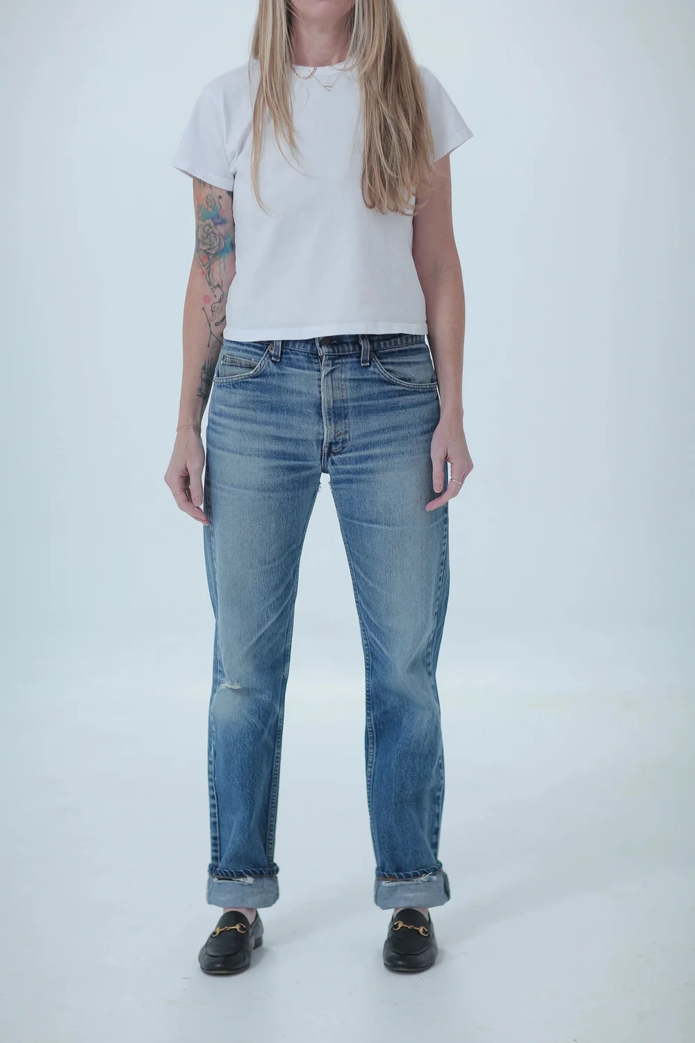 Levi's 505 light medium wash, distressed, boyfriend fit worn cuffed, front view