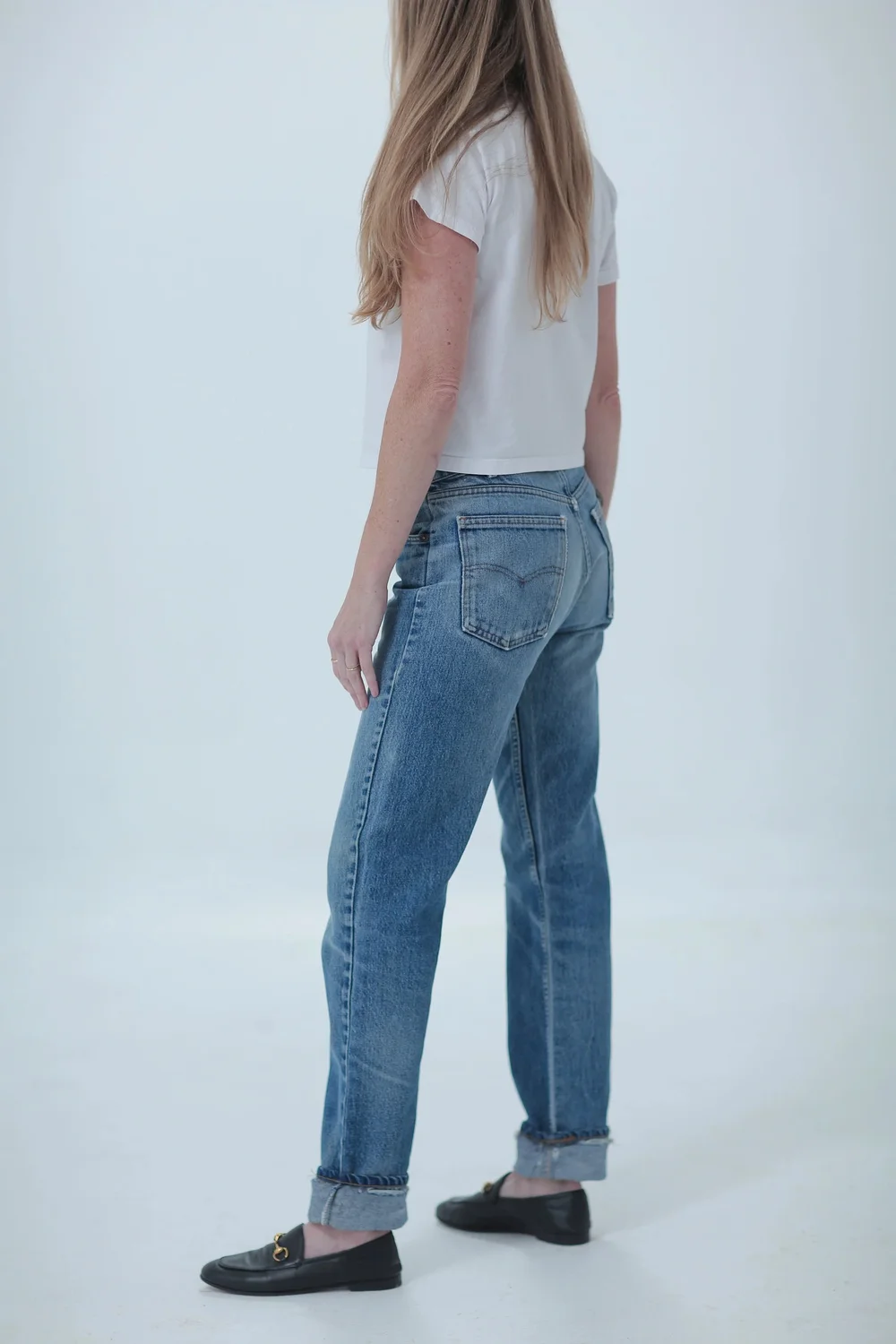 Levi's 505 light medium wash, distressed, boyfriend fit worn cuffed, side view