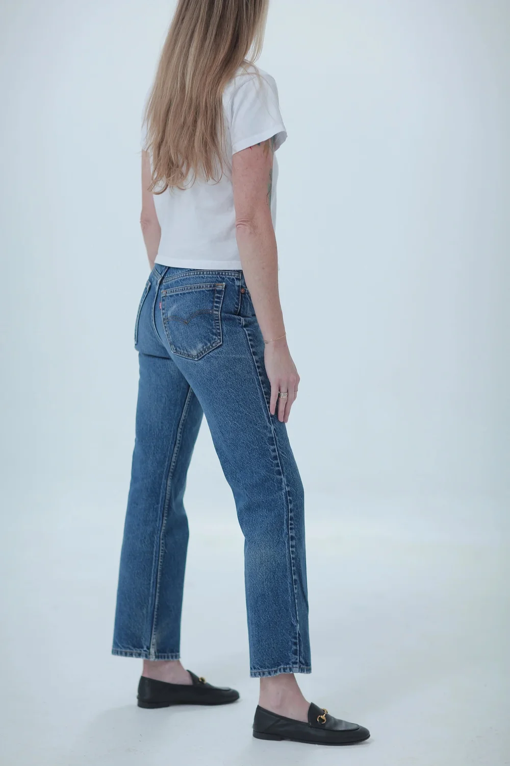 Levi's 517 darker wash, fitted in hips with a little room in waist, side view