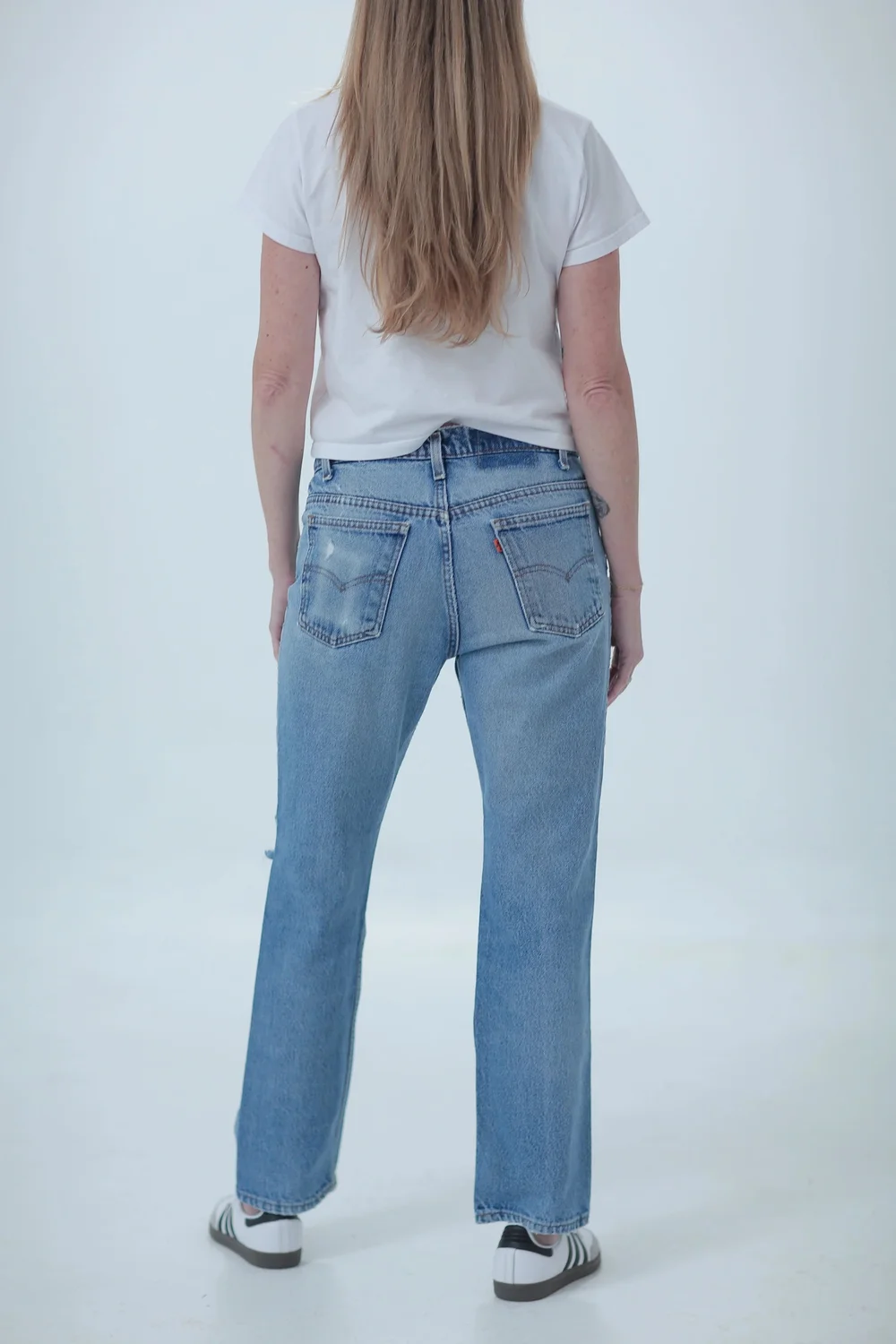 Levi's 509 light medium wash, distressed, boyfriend fit, rear view