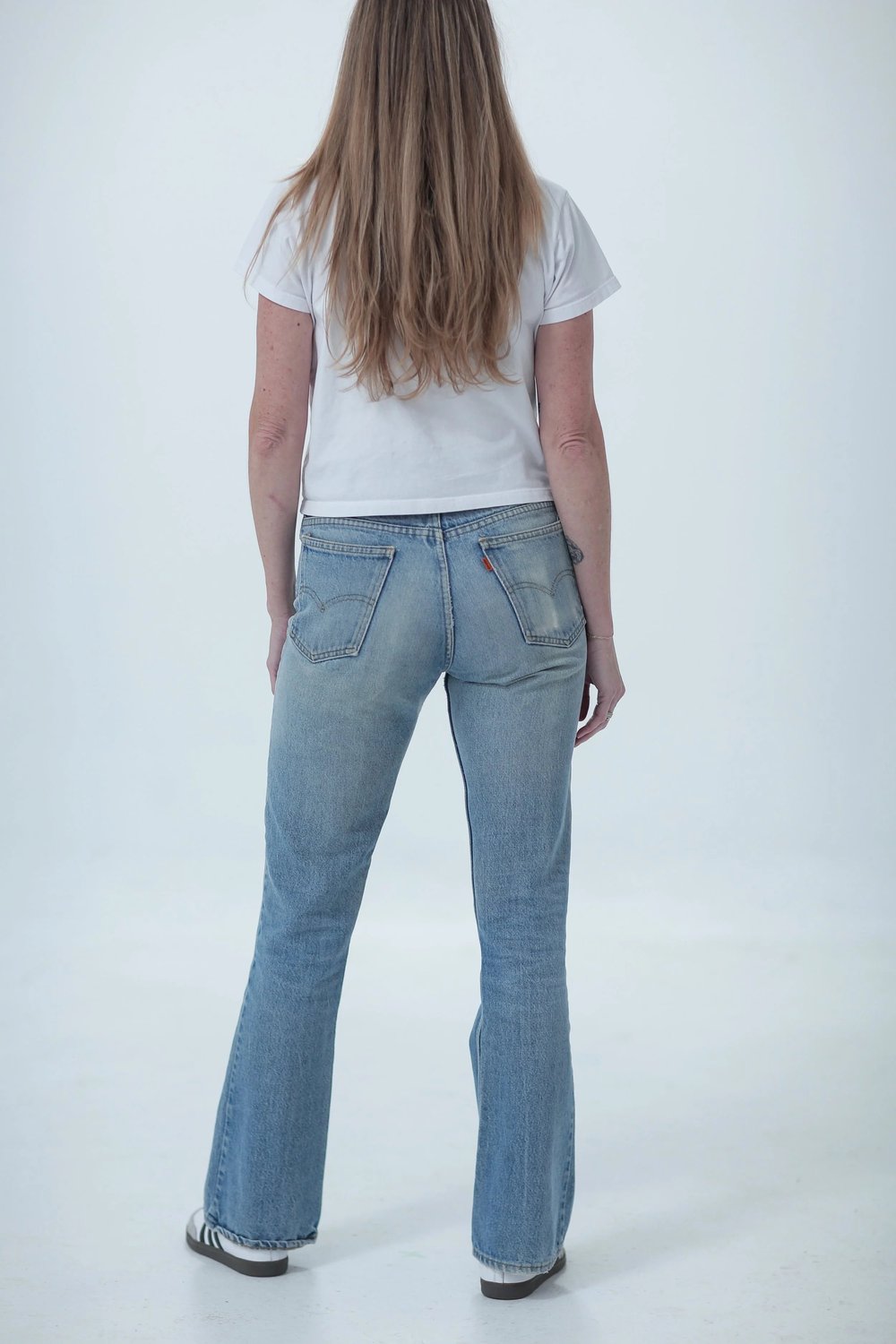 Levi's 646 lighter medium wash, fitted, rear view