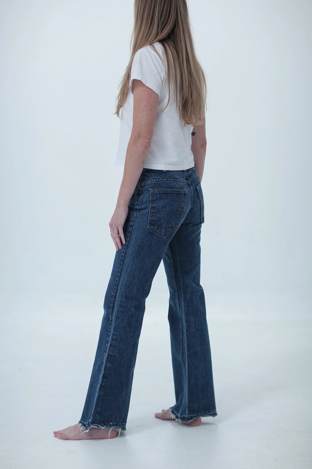 Levi's 684 dark wash, fitted with a little room, side view