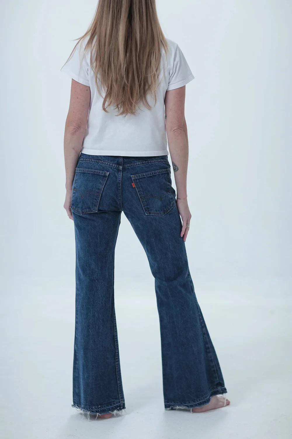 Levi's 684 dark wash, fitted with a little room, rear view