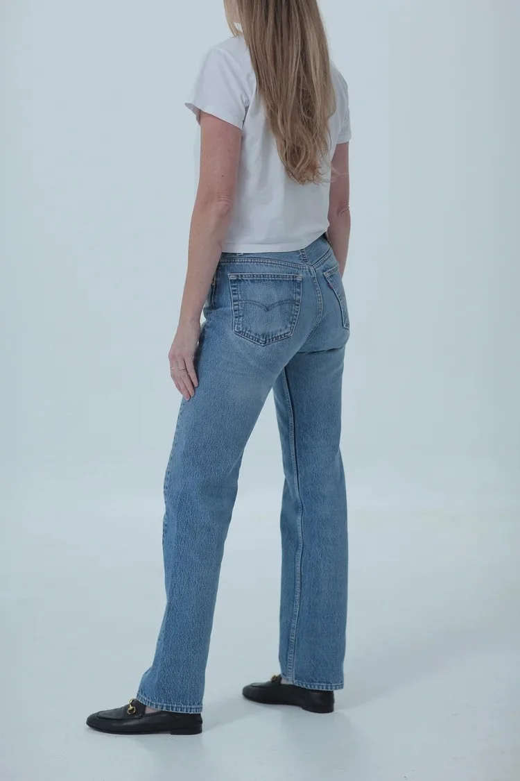 Levi's 501 light medium wash, fitted with a little room, full length, side view