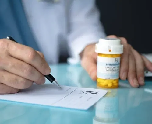 Psychiatric Nurse writing an RxP