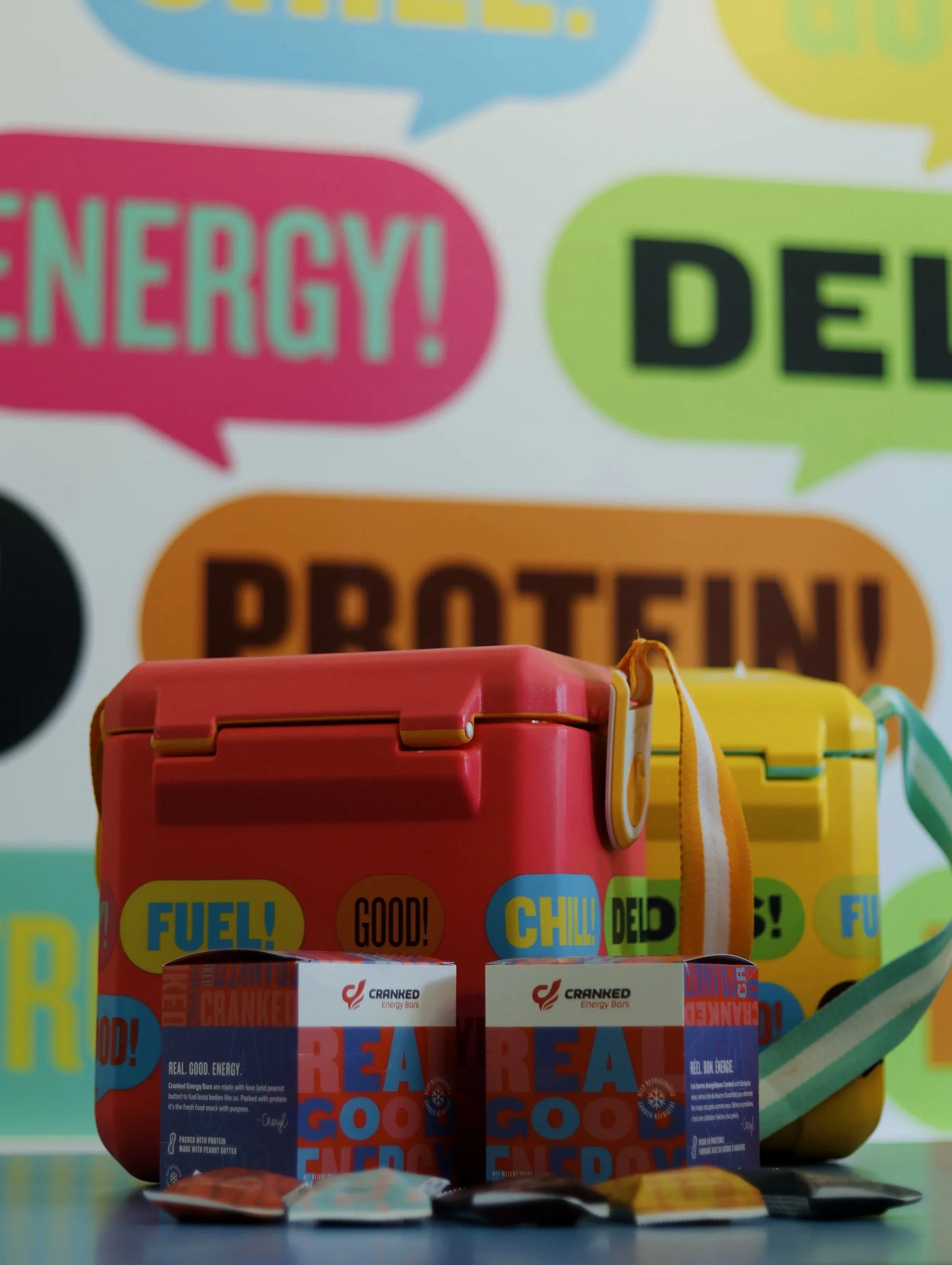 Cranked Energy Bars and colourful coolers and background
