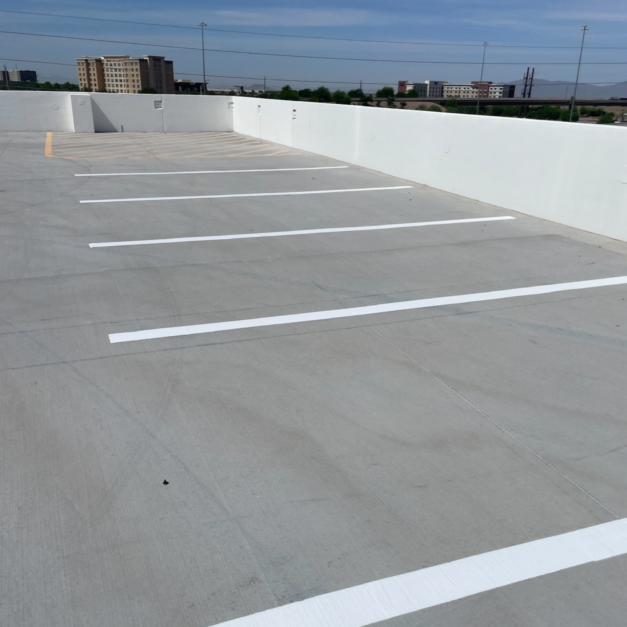 Parking lot striping done by Cactus Sweeping in Arizona.