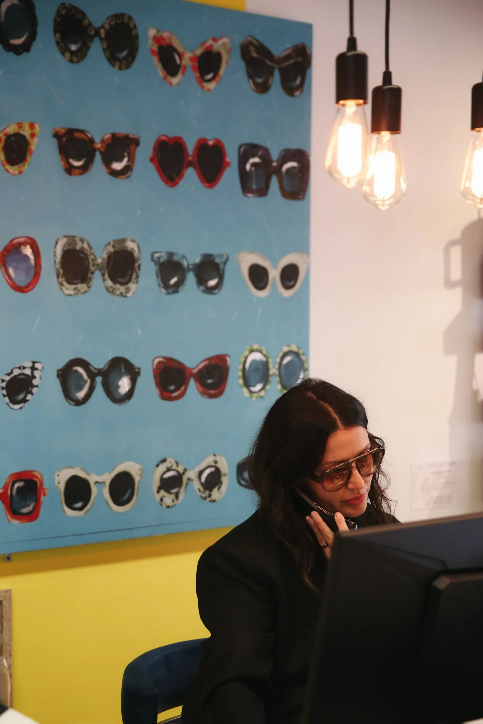 Answering the phone at Optical Image in Swift Current