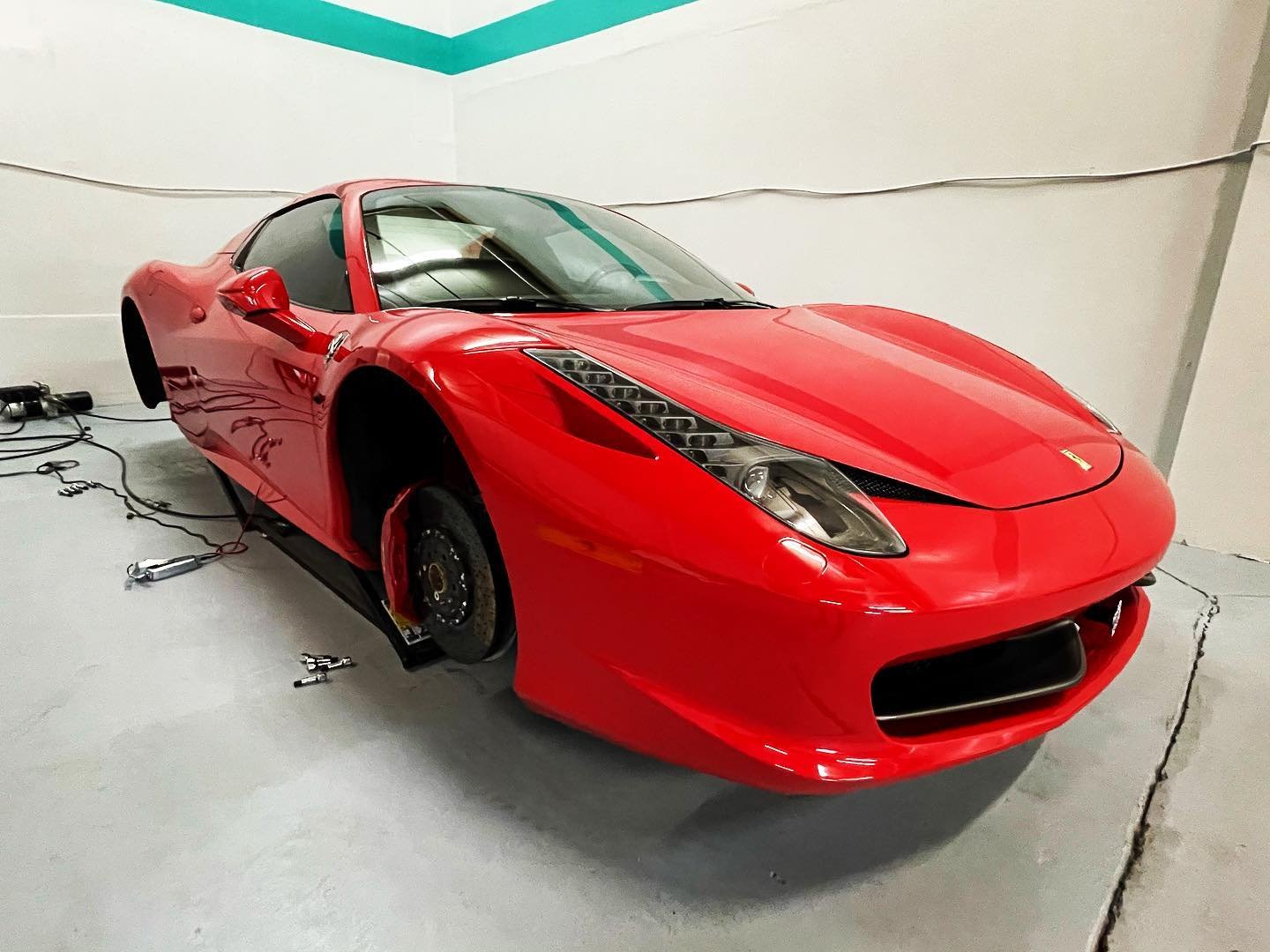 Good morning #instagram 
🚩🚩🚩🚩🚩🚩🚩🚩🚩🚩Here&rsquo;s a Ferrari 458 Spider that came in for a custom striping package, and some aggressive cosmetic touches. 

The client wanted Gloss Black Powder Coated wheels and an Italian themed stripe package
