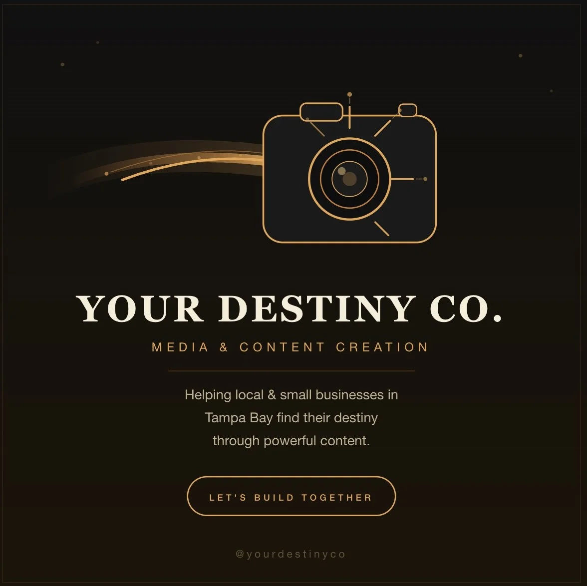 A dark-themed promotional graphic for 'Your Destiny Co.,' a media and content creation company, featuring an outline of a camera with gold accents, a tagline about helping local businesses in Tampa Bay, and a call-to-action button that says 'Let's Build Together'.