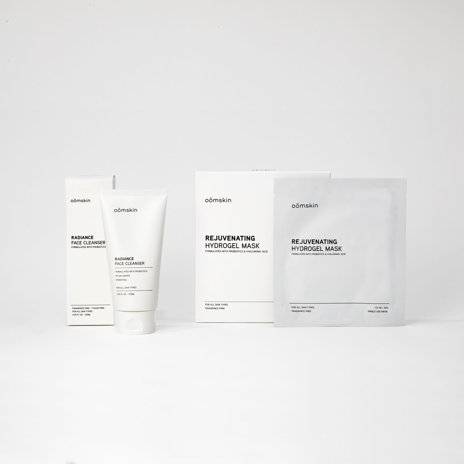 Skincare products, including a tube and box of Radiance Face Cleanser and a box and pouch of Rejuvenating Hydrogel Mask, displayed on a white background.
