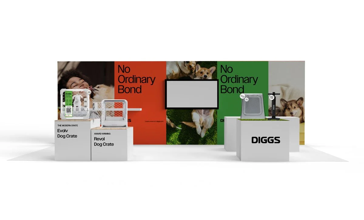 Exhibition display showcasing dog crates and pet products by brands Evolv and Revol, with a colorful backdrop featuring images of dogs and the text 'No Ordinary Bond'.