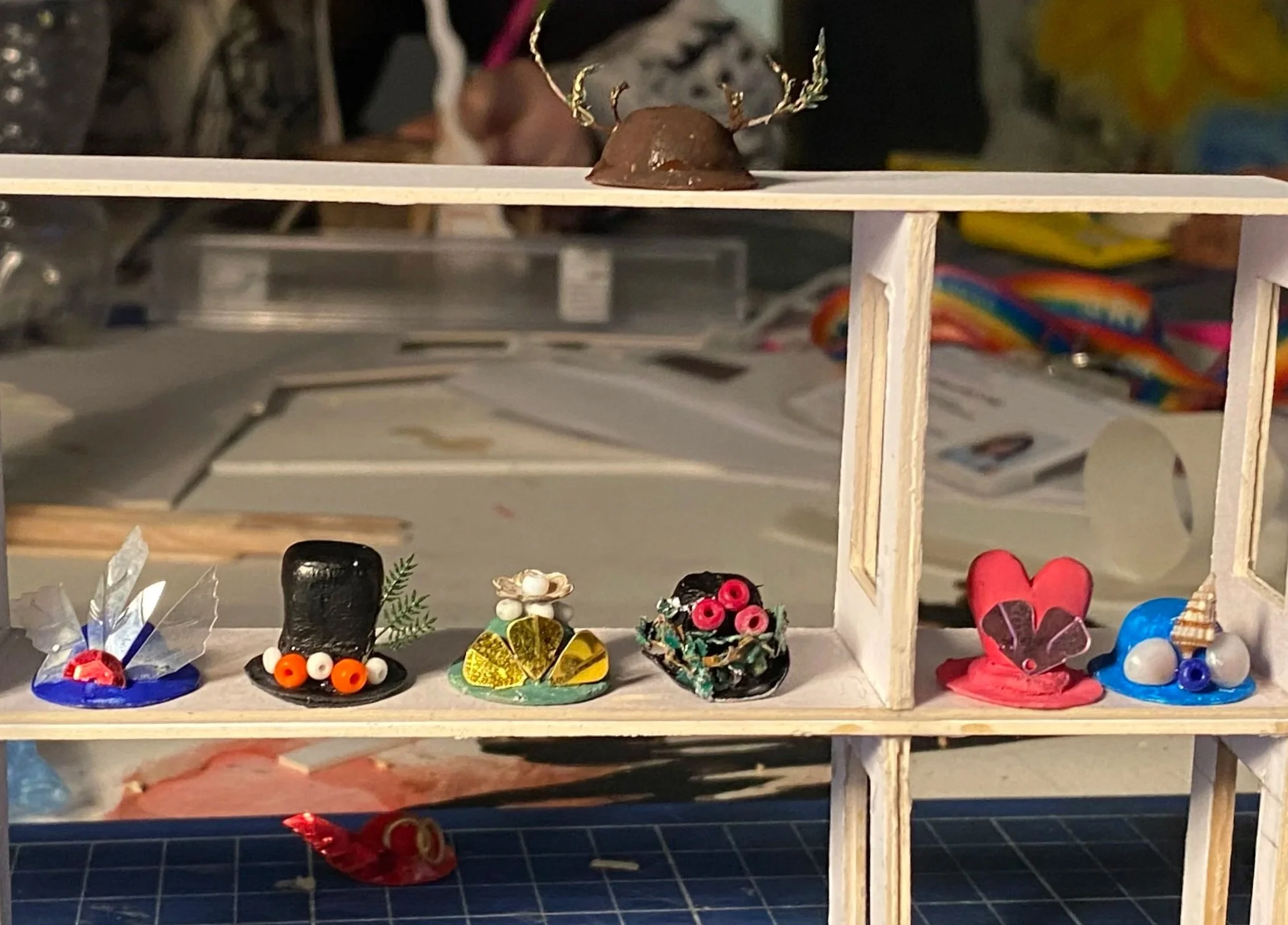 Decorated hats on the shelf 