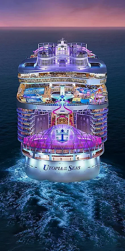 A large cruise ship named "Utopia of the Seas" sailing on the ocean at sunset, illuminated with colorful lights, with multiple decks featuring pools, water slides, and entertainment areas.