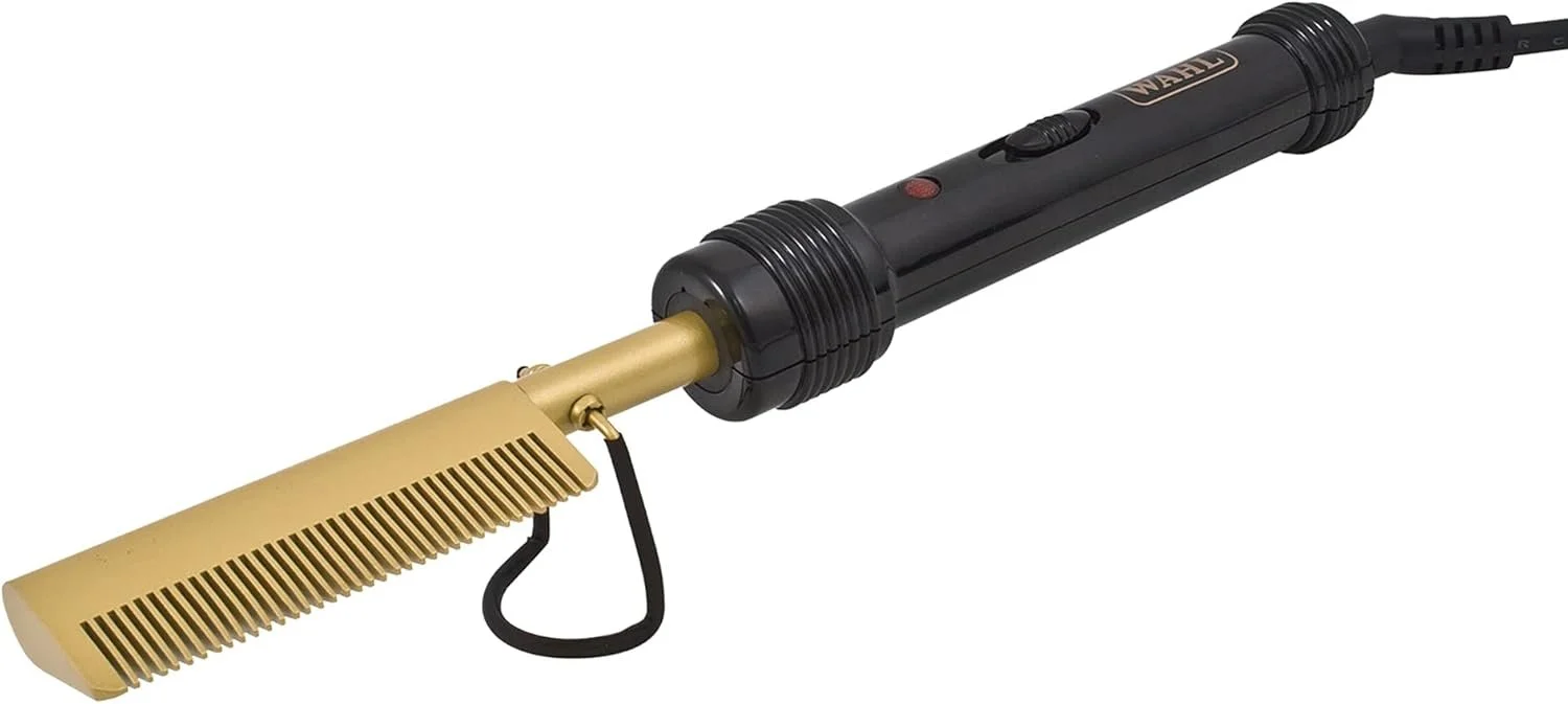 A professional blow dryer with a gold filter attachment, black handle, and power cord.