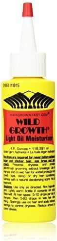 A bottle of Wild Growth Light Oil Moisturizer with a white cap and yellow and red label.