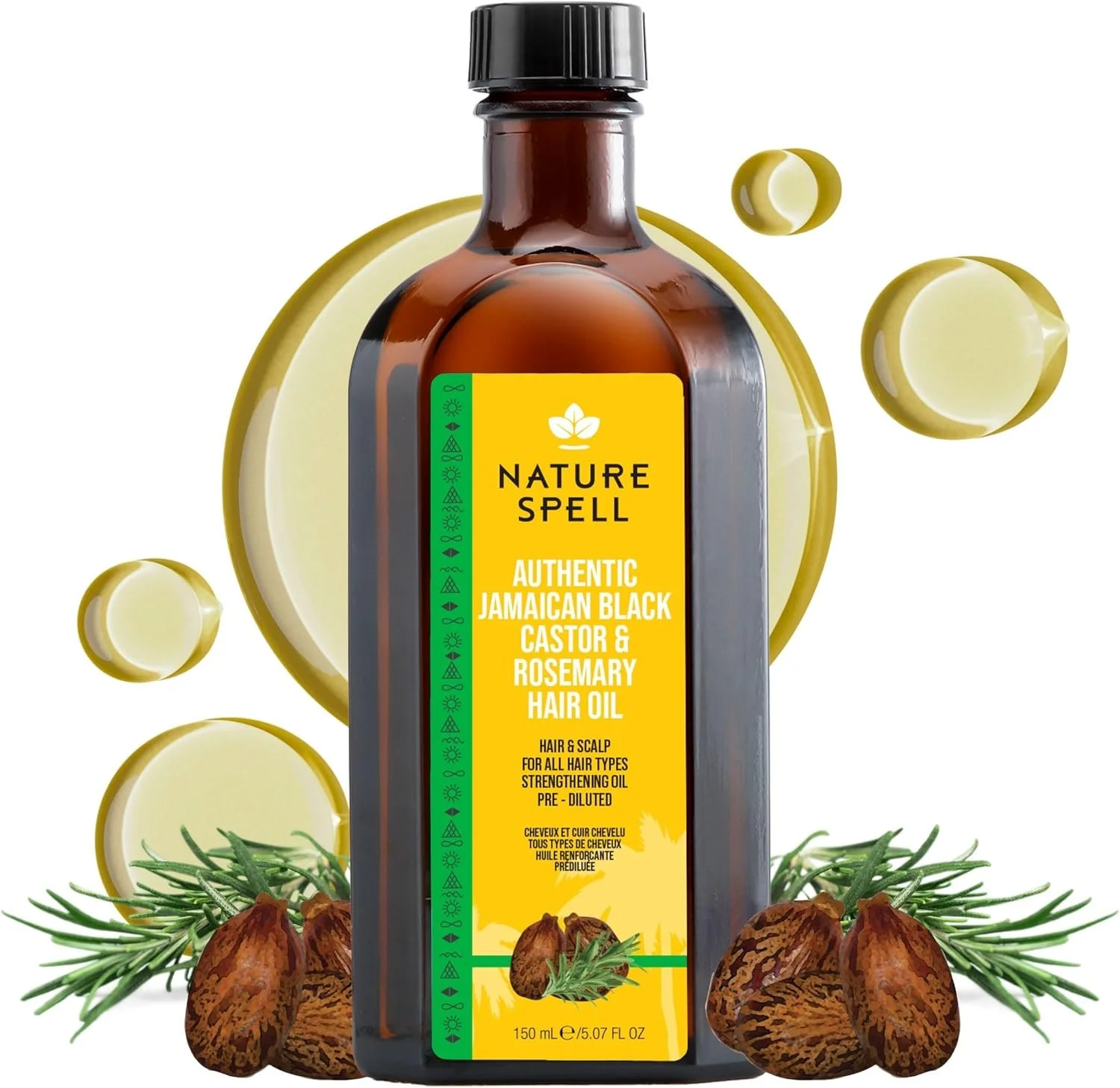 A bottle of Nature Spell Jamaican black castor and rosemary hair oil surrounded by rosemary sprigs, shea nuts, and several large yellow capsules, with a white background.