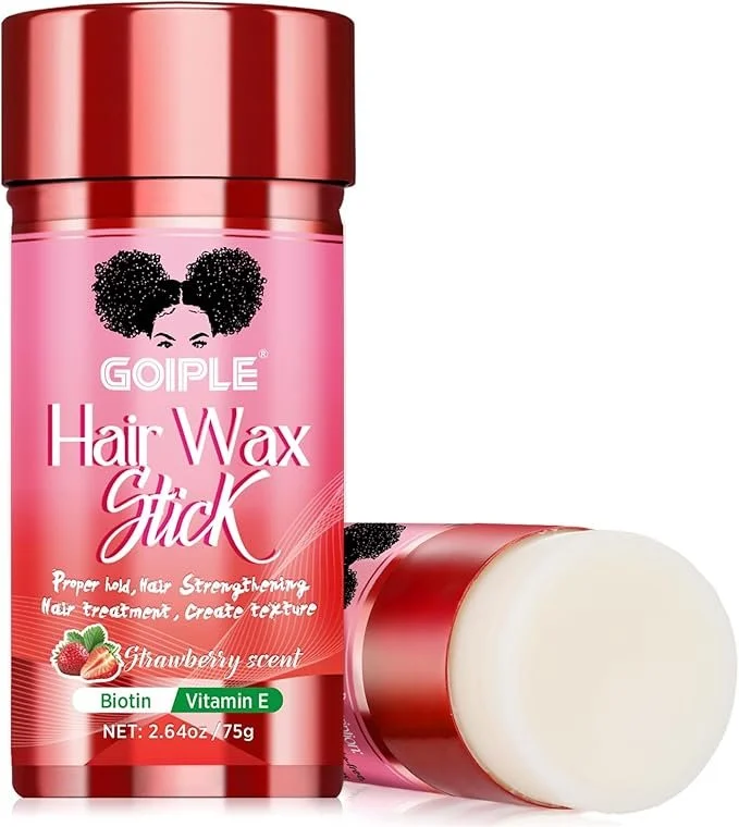A pink container of GOIPLE Hair Wax Stick with strawberry flavor, featuring a black and white illustration of a woman's face with curly hair on the label, and a matching lip balm or wax stick lying down next to it.