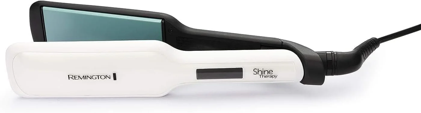 Remington Shine Therapy hair straightener with black handle and white body.