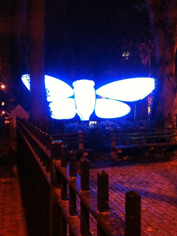 Love Motel for Insects: Magicicada Variation. Commissioned by the Staten Island Museum, Staten Island, NY, USA. Fall 2012. Outdoor installation and Eco-Actions (public field-trips) with: Black Ultra-violet lights, steel, fabric, native plants, invite