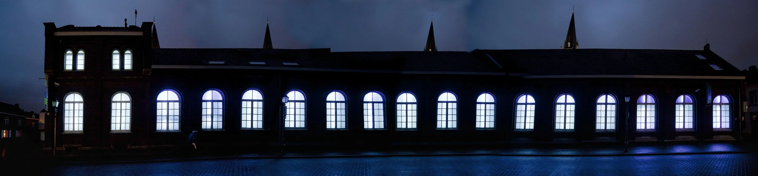 Love Motel for Insects: Museum Het Domein Variation. Museum Het Domein, Sittard, The Netherlands, 2014. Ultra-violet lights installed in museum windows, filters, invited insects. Photograph by Bert Janssen.