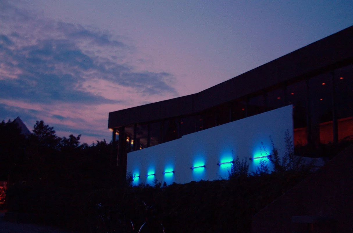 Love Motel for Insects: Ingolstadt Variation. Kunstverein Ingolstadt, Ingolstadt, Germany. Summer 2005. Outdoor installation with: Black Ultra-violet lights, wood, fabric, invited insects. 2 by 5 by 2 meters. Photograph by Thomas Neumaier.