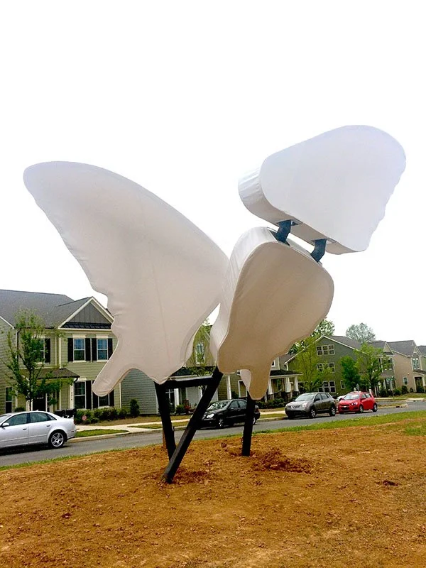 Love Motel for Insects: Eastern Tiger Swallowtail Variation. 2015. Brightwalk, Charlotte, NC. Outdoor light sculpture shaped after a Eastern Tiger Swallowtail butterfly (Papilio glaucus). Black Ultra-violet lights, steel, aluminum, fabric, native pla