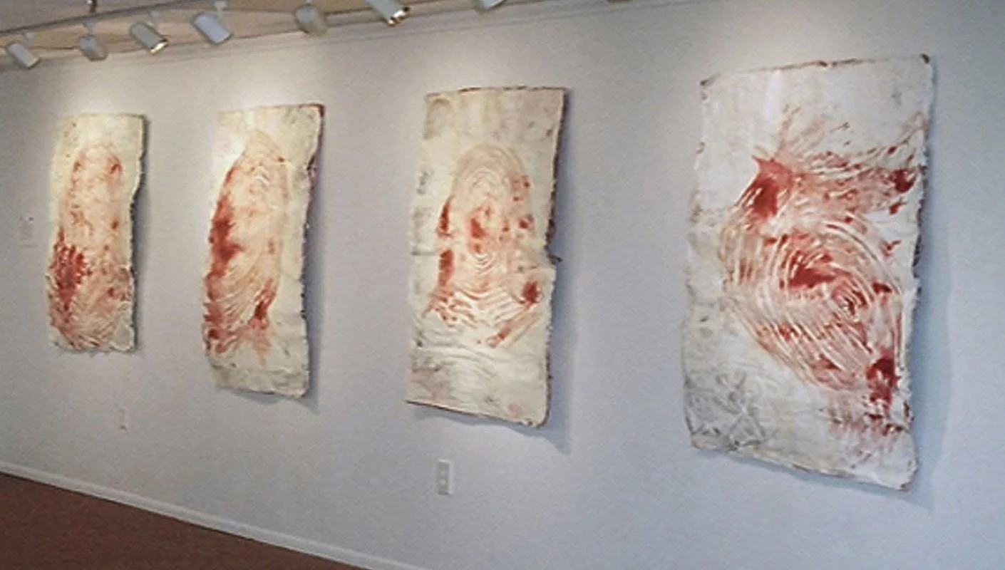 Alchimie de la Douleur. 2005- Ongoing. Individual drawing size approx H 60 inches x W 46 inches x D 75 inches. Series of 10 drawings based on the artist’s fingerprints.The artist’s blood, cadmium, dioxin, petrochemicals, mercury, lead, PCPs, and othe
