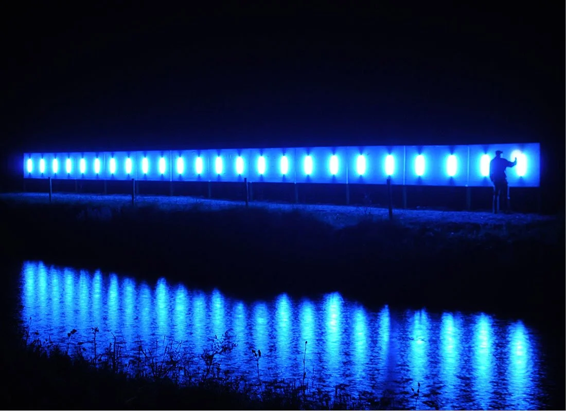 Love Motel for Insects: Lough Boora Variation. Sculpture in the Parklands, Lough Boora, Ireland. Summer 2010. Outdoor installation with: Black Ultra-violet lights, wood, fabric, invited insects. 2 by 30 meters. Photographs by Kevin O’Dwyer.